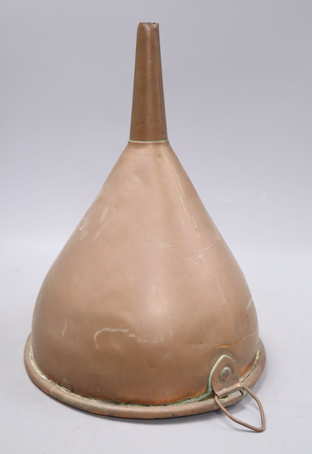 A large copper funnel, c.1840, height 36cm